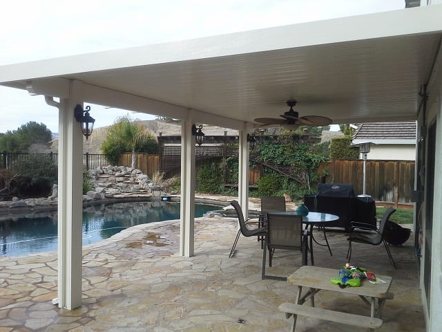 A patio area near the pool