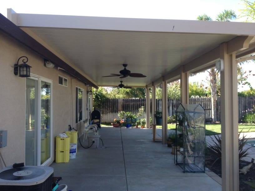 A patio with ceiling fans